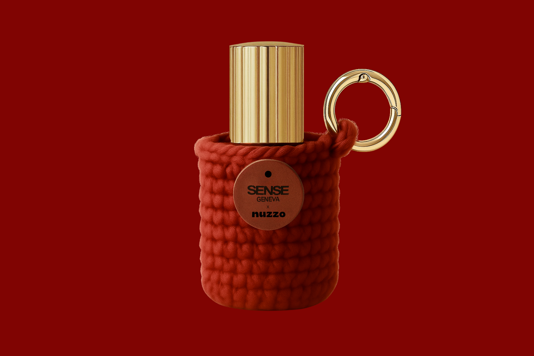 Flacon d’huile de parfum Sense Geneva dans un étui porte-clés